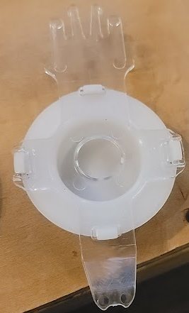 A custom dispenser adapter designed and printed in quantity